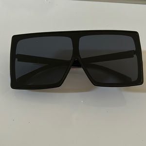 Women’s dark squared shades.